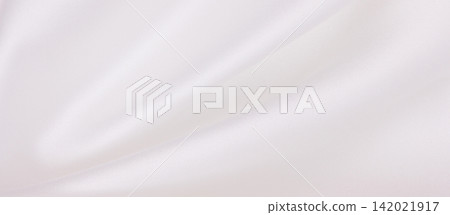 Smooth elegant white silk or satin luxury cloth texture as wedding background. Luxurious background design Smooth elegant white silk or satin luxury cloth texture as wedding background. Luxurious background design 142021917