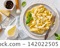 Fettuccine al Formaggio, Italian Pasta on a plate 142022505