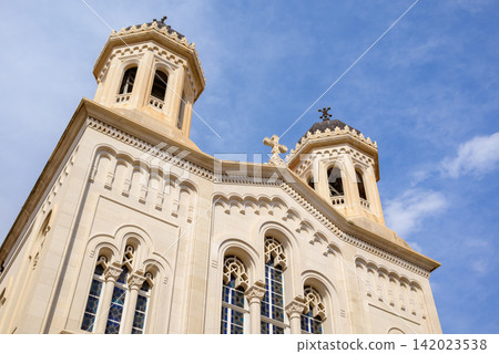 A grand light-colored stone Greek Orthodox cathedral with two octagonal bell towers A grand light-colored stone Greek Orthodox cathedral with two octagonal bell towers 142023538