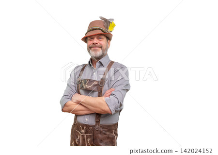 Smiling mature man in Bavarian costume standing with crossed arms ISOLATED Smiling mature man in Bavarian costume standing with crossed arms ISOLATED 142024152