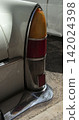 Tavernes Blanques, Spain - June 14, 2026. Detailed close up of the rear tail light assembly with chrome trim on a white Seat parked on a street 142024398