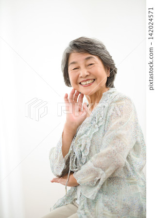 Portrait of an 80-year-old woman Portrait of an 80-year-old woman 142024571