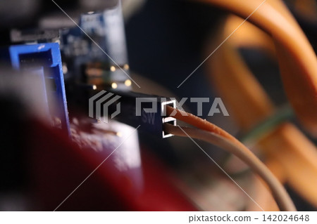 Close-up of Electronic Circuit Board with Wires and Switch Close-up of Electronic Circuit Board with Wires and Switch 142024648