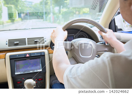 A senior couple going out in their car A senior couple going out in their car 142024662
