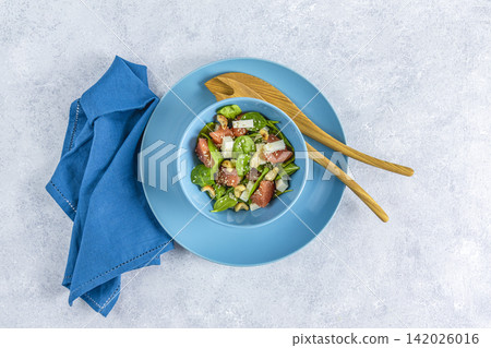 Vegan plate with lettuce, feta cheese, grapefruit, sesame and nuts Vegan plate with lettuce, feta cheese, grapefruit, sesame and nuts 142026016