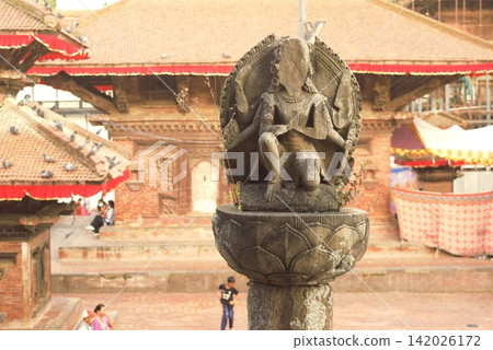 Stone statues and traditional architecture in Kathmandu Durbar Square Stone statues and traditional architecture in Kathmandu Durbar Square 142026172