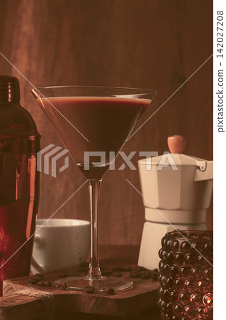 espresso martini cocktail, alcoholic drink, shaker and geyser coffee maker, on a wooden background, espresso martini cocktail, alcoholic drink, shaker and geyser coffee maker, on a wooden background, 142027208