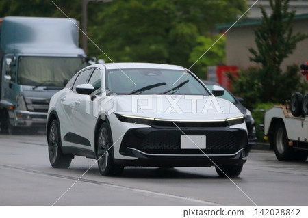 White Japanese sedan image 142028842