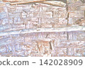 A textured background of an old wooden wall made from decaying wood. 142028909