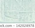 Minimalist background material featuring a light blue concrete wall and separator holes. 142028978
