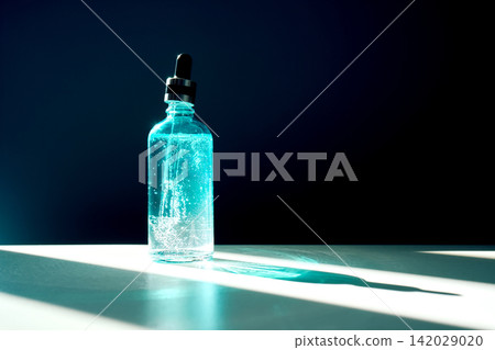Blue serum dropper bottle skincare product concept Blue serum dropper bottle skincare product concept 142029020