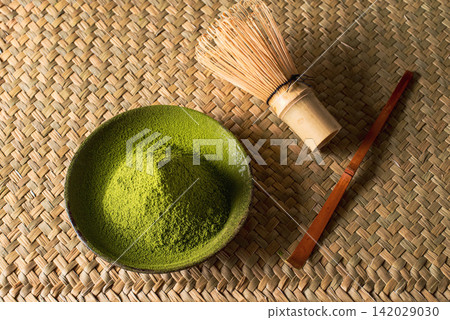 The image of Japanese tea ceremony and Japanese culture using matcha powder and a bamboo whisk. The image of Japanese tea ceremony and Japanese culture using matcha powder and a bamboo whisk. 142029030