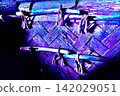 The texture of the woven wooden walls and rope decorations of the ancient dwelling, which glows with a blue-purple hue. 142029051