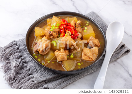 braised Chicken with Winter Melon Chinese Soup Dish braised Chicken with Winter Melon Chinese Soup Dish 142029311