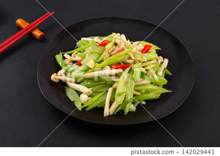 stir Fried Celery with White Beech Mushroom Dish 142029441