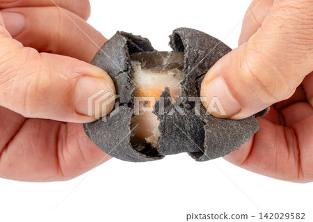 black Charcoal Salted Egg Yolk Pastry Sliced black Charcoal Salted Egg Yolk Pastry Sliced 142029582