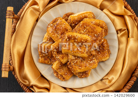 traditional Macau Mini Chicken Biscuits with Sesame Seeds traditional Macau Mini Chicken Biscuits with Sesame Seeds 142029600