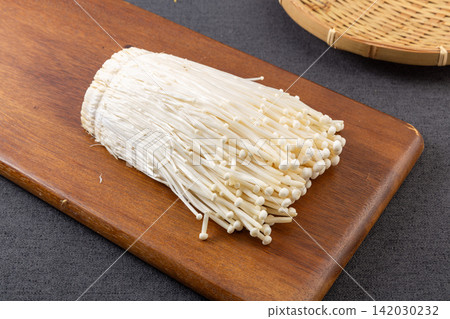 fresh Enoki Mushrooms Vegetable Ingredient Close Up fresh Enoki Mushrooms Vegetable Ingredient Close Up 142030232