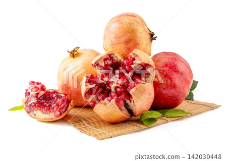 fresh Pomegranate Fruit With Seeds Close Up fresh Pomegranate Fruit With Seeds Close Up 142030448