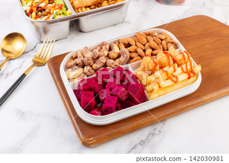 fruit Nuts and Sweet Potato Fries Meal Box Food fruit Nuts and Sweet Potato Fries Meal Box Food 142030981