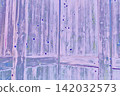 Old, purplish wooden plank walls with a wood grain texture featuring nail holes. 142032573