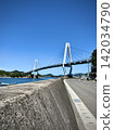 Yuge Ohashi Bridge as seen from the coastal road and breakwater (Yumeshima Kaido, Kamijima Town, Ehime Prefecture) 142034790