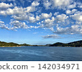Clouds spread across the blue sky and the islands of the Seto Inland Sea (Shimanami Kaido - bridge in the distance) 142034971