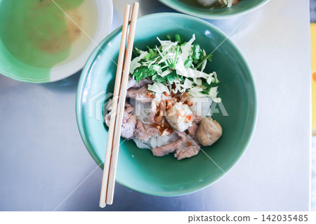 dry noodles or plain noodles, Chinese noodle with meatball and beef or noodles without soup 142035485