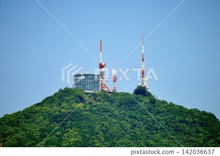 Clear blue sky and the observation deck and radio tower at the summit of Mt. Inasa, Nagasaki City, Nagasaki Prefecture Clear blue sky and the observation deck and radio tower at the summit of Mt. Inasa, Nagasaki City, Nagasaki Prefecture 142036637