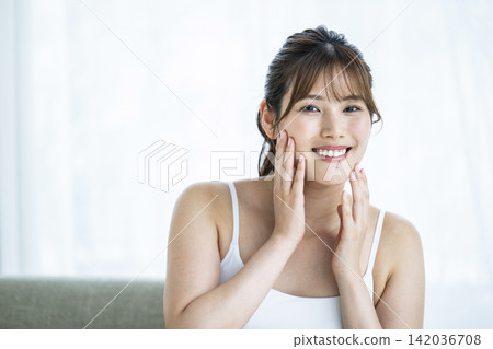 Young woman beauty skin care white background smile Young woman beauty skin care white background smile 142036708