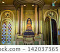 The statue of Billiken, the god of good fortune, and the gold leaf decorations enshrined in Tsutenkaku Tower in Osaka. 142037365