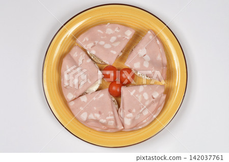 Mortadella Sandwiches with Cherry Tomatoes on Yellow Plate Mortadella Sandwiches with Cherry Tomatoes on Yellow Plate 142037761