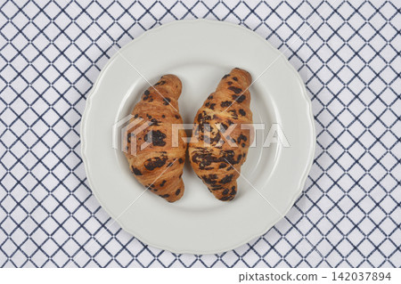 Two Chocolate Croissants Two Chocolate Croissants 142037894