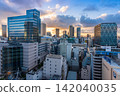 Modern city skyline and skyscrapers at sunrise in Toshima, Ikebukuro, Tokyo, Japan 142040035