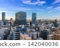 Modern city skyline and skyscrapers on sunny summer day in Toshima, Ikebukuro, Tokyo, Japan 142040036