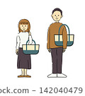A couple carrying shopping bags 142040479