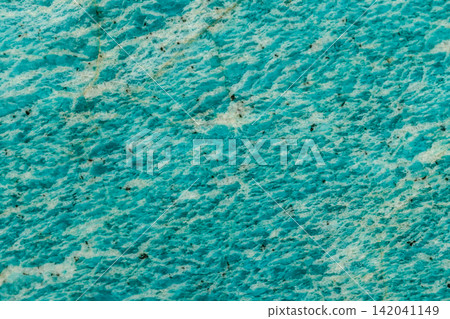 Macro of mineral stone amazonite on a black background Macro of mineral stone amazonite on a black background 142041149