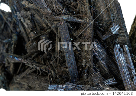 Macro stone mineral Antimonite, Stibnite on a white background Macro stone mineral Antimonite, Stibnite on a white background 142041168