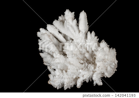 Macro stone Calcite mineral on a black background Macro stone Calcite mineral on a black background 142041193