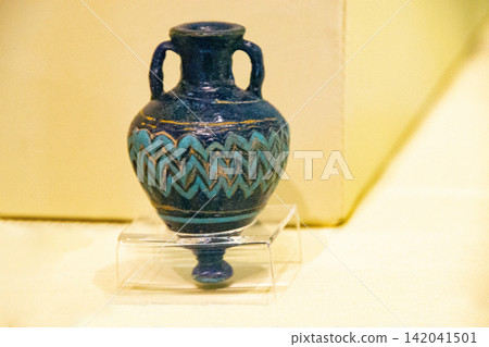 Antique ceramic decorative amphora on a white background Antique ceramic decorative amphora on a white background 142041501
