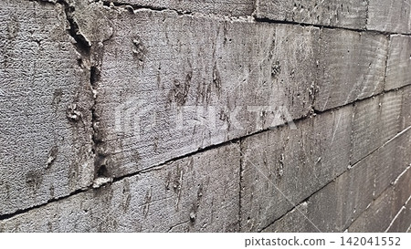 Textured Gray Concrete Brick Wall Background Textured Gray Concrete Brick Wall Background 142041552