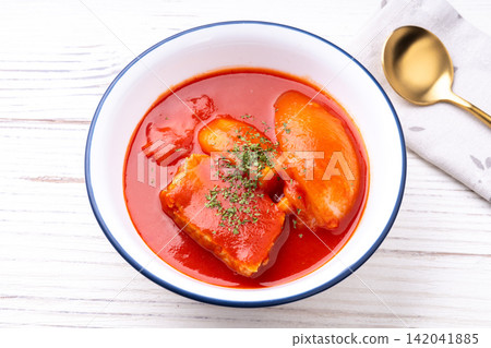 Pork and tomato stew Pork and tomato stew 142041885