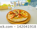 Seafood pizza at a seaside ocean-view restaurant/cafe - perfect for a hotel lunch or vacation (Amami Oshima, Kagoshima Prefecture) 142041918