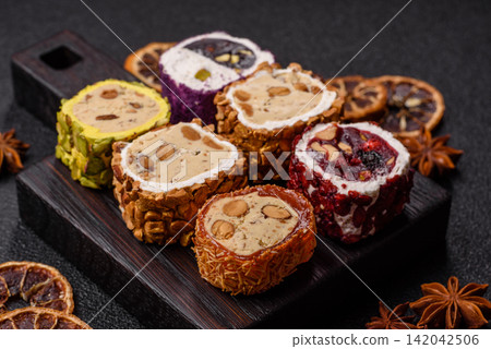 Turkish delight or lokum is a traditional Eastern sweet made with nuts. Turkish delight, lokum Turkish delight or lokum is a traditional Eastern sweet made with nuts. Turkish delight, lokum 142042506