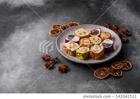 Turkish delight or lokum is a traditional Eastern sweet made with nuts. Turkish delight, lokum Turkish delight or lokum is a traditional Eastern sweet made with nuts. Turkish delight, lokum 142042511