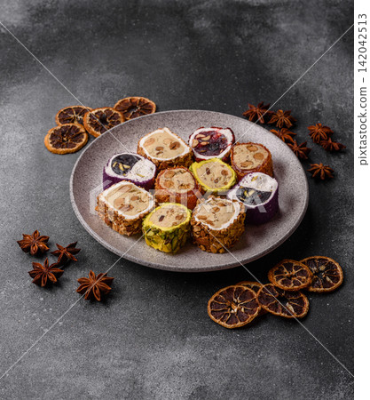 Turkish delight or lokum is a traditional Eastern sweet made with nuts. Turkish delight, lokum Turkish delight or lokum is a traditional Eastern sweet made with nuts. Turkish delight, lokum 142042513