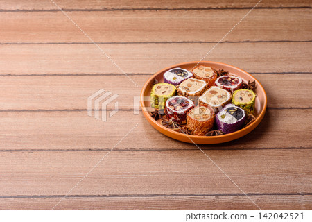 Turkish delight or lokum is a traditional Eastern sweet made with nuts. Turkish delight, lokum Turkish delight or lokum is a traditional Eastern sweet made with nuts. Turkish delight, lokum 142042521