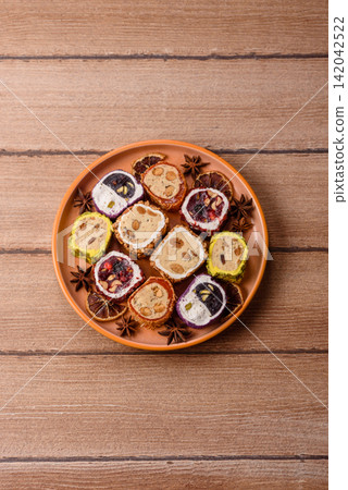 Turkish delight or lokum is a traditional Eastern sweet made with nuts. Turkish delight, lokum Turkish delight or lokum is a traditional Eastern sweet made with nuts. Turkish delight, lokum 142042522