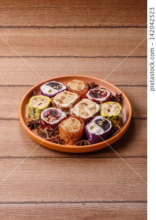 Turkish delight or lokum is a traditional Eastern sweet made with nuts. Turkish delight, lokum Turkish delight or lokum is a traditional Eastern sweet made with nuts. Turkish delight, lokum 142042523