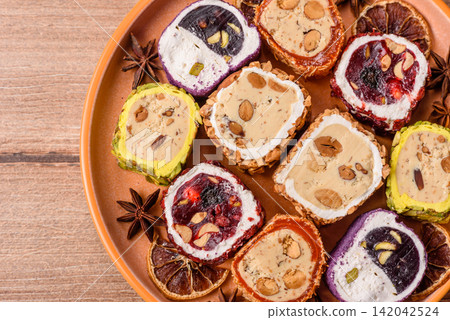 Turkish delight or lokum is a traditional Eastern sweet made with nuts. Turkish delight, lokum Turkish delight or lokum is a traditional Eastern sweet made with nuts. Turkish delight, lokum 142042524